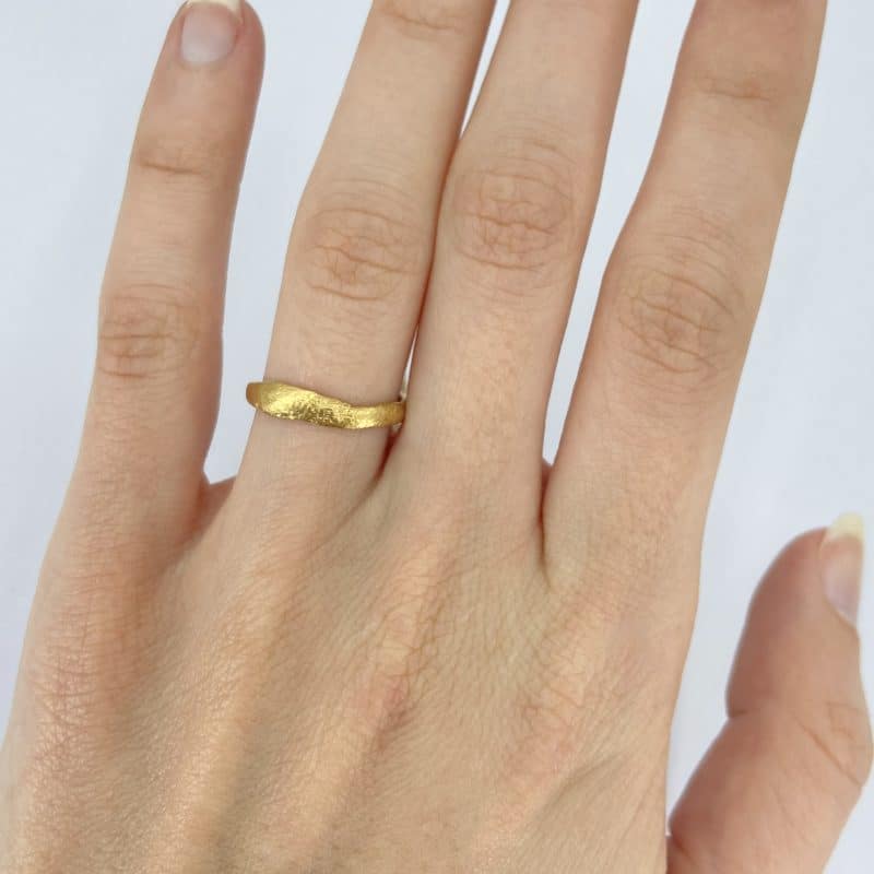 18ct organic form ring on the body