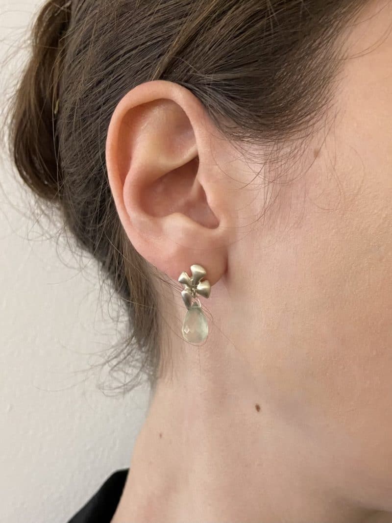 clover studs with prehnite on the body