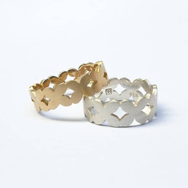 gold and silver 4 petal rings